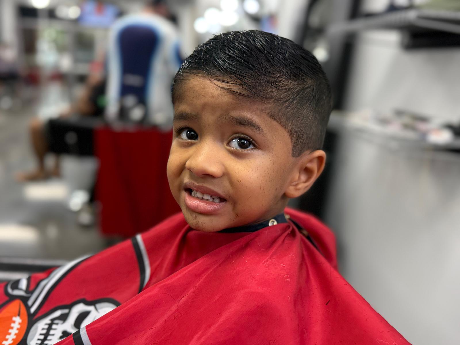 Young client with a fresh side-swept haircut